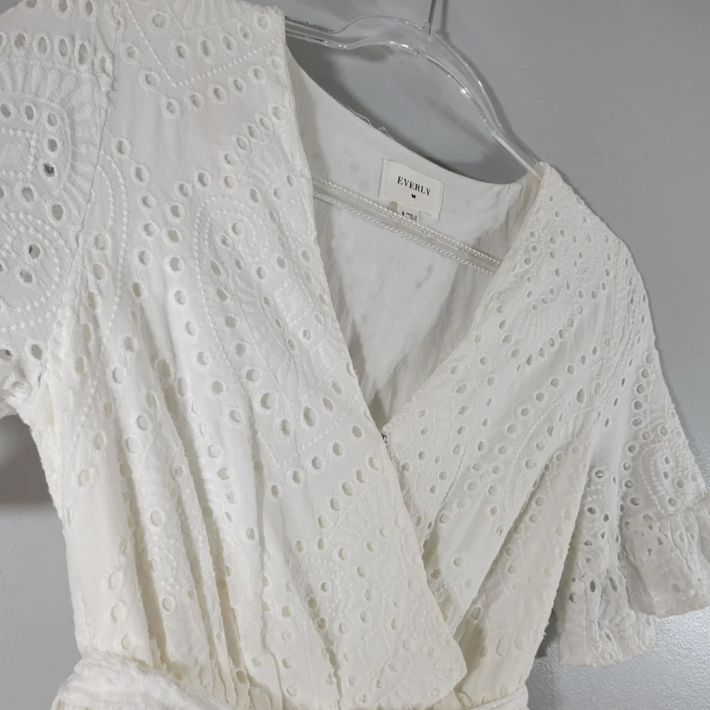 EVERLY white eyelet surplice faux wrap belted cotton ruffle hem romper